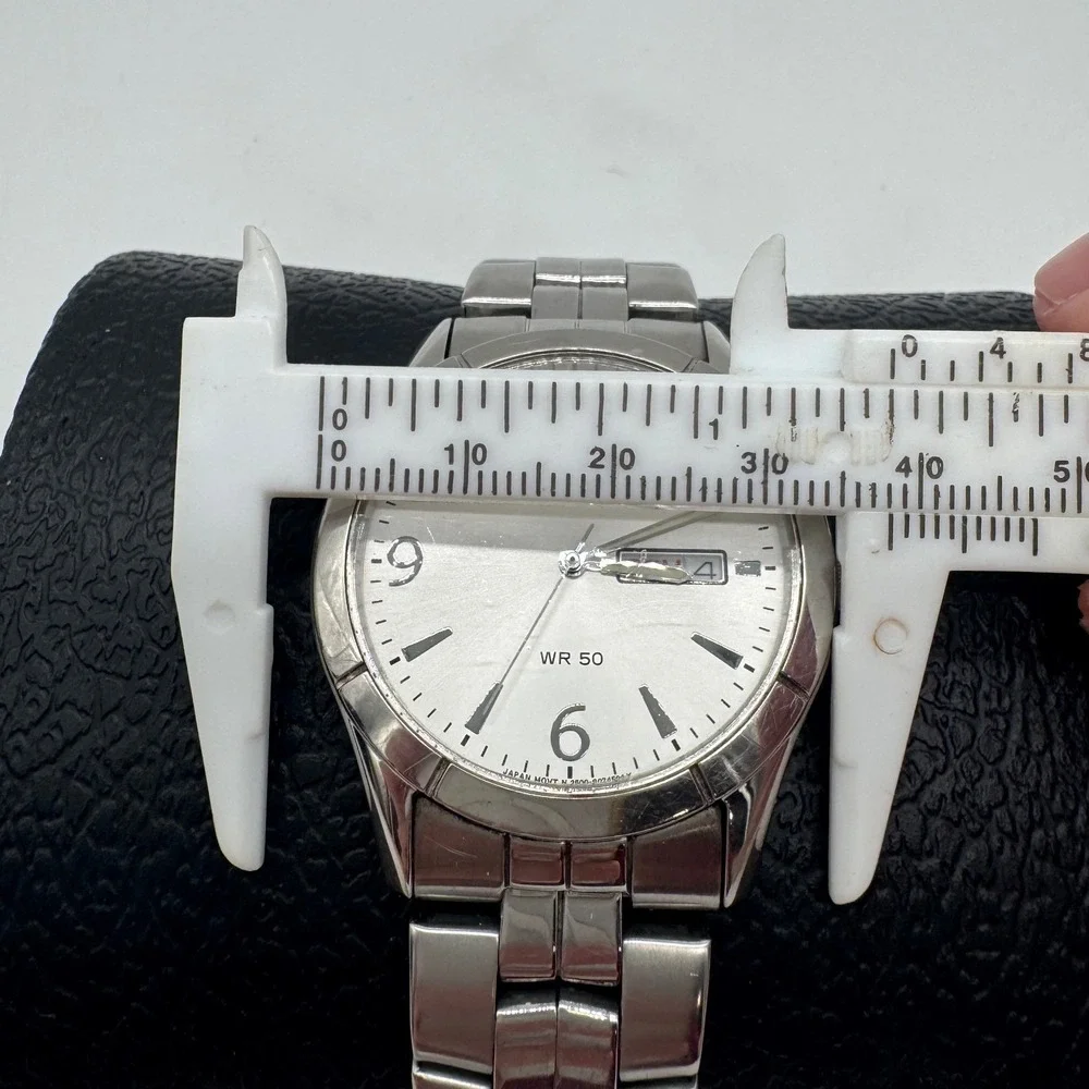 Citizen Quartz Mens Watch Silver Tone Stainless Steel Day Date WR50 2500-S074504